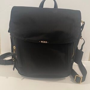 Mini Tumi Black Backpack with Gold Accents